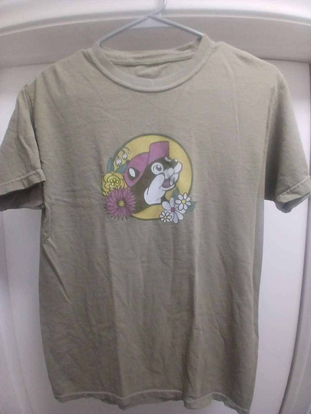 Buc-ees Olive Green Graphic Tee with Playful Animal and Floral Motif